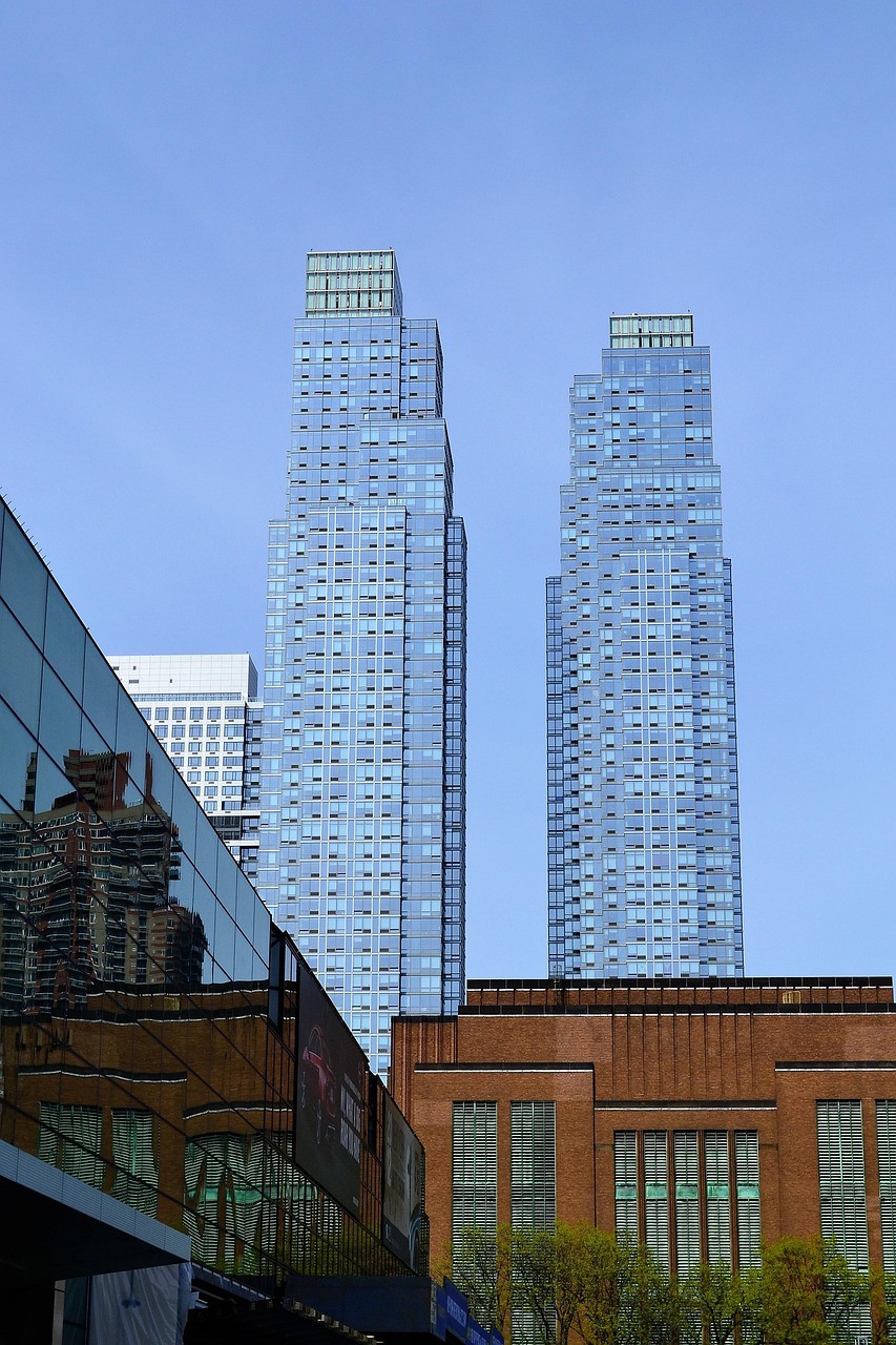 skyscrapers, new york city, manhattan, buildings, architecture, nyc, high-rise, cityscape, outdoors, modern, exterior, sky, downtown, business, commercial, real estate, factory, storage building, metropolis, blue sky, city, success, office building, office building exterior, office buildings, work, corporate, glass, professional, successful, workplace, tower, structure, design, high, blue, technology, financial district, communication, duo, double, two, skyline, occupy, vision, motivation, education, commercial buildings, real-estate, windows, electricity, contemporary, power, solar energy, panel, industry, future, futuristic, perspective, looking up, view, facade, apartment, property, corporation, growth, development, new, meeting, nature, construction, home, house, domicile, edifice, erection, framework, pile, superstructure, ziggurat, blue home, blue education, blue meeting, blue motivation, blue future, blue growth, blue conference, blue vision